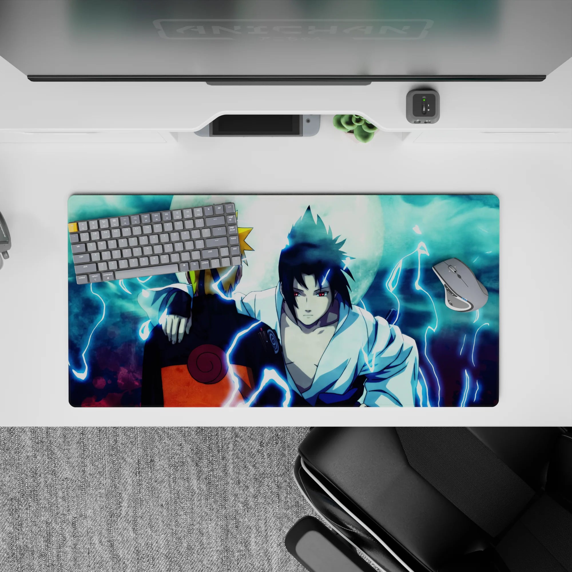 Mouse pad featuring Naruto and Sasuke back-to-back under a moonlit sky, size 32x16 inches, capturing intense emotion.