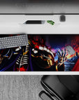 Ainz Ooal Gown anime desk pad, 36x16 inches, featuring Ainz in blackened bone armor amidst flames and violet shadows.