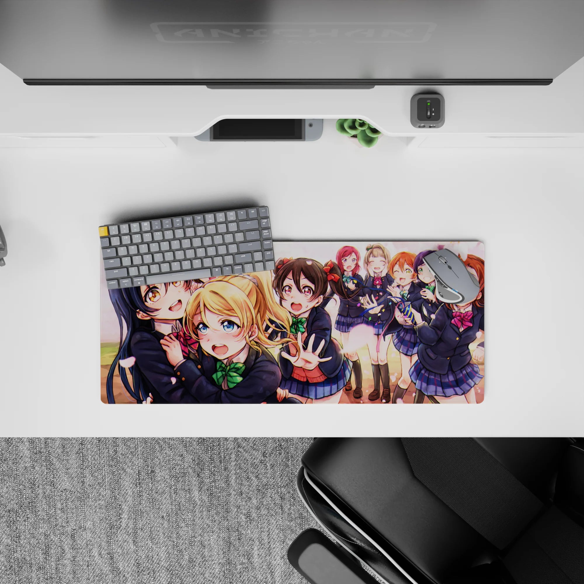 28x12 inches anime girl mouse pad in navy and sakura pink, drifting petals and warm sunset spring mood.