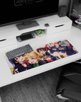 Umi Sonoda hugs Eli Ayase while Nico reaches out on anime girl mouse pad 32x12 inches.