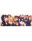 Love Live anime girl mouse pad 32x12 inches with school idols in navy uniforms and falling petals.