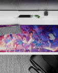 36x16 inches anime desk pad in sunset violets, cotton-candy pink, and ocean blues with dreamy concert vibe.