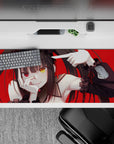 Goth-cute anime desk mat 36x16 inches in red and black, teasing vibe with mismatched gold and crimson eyes.