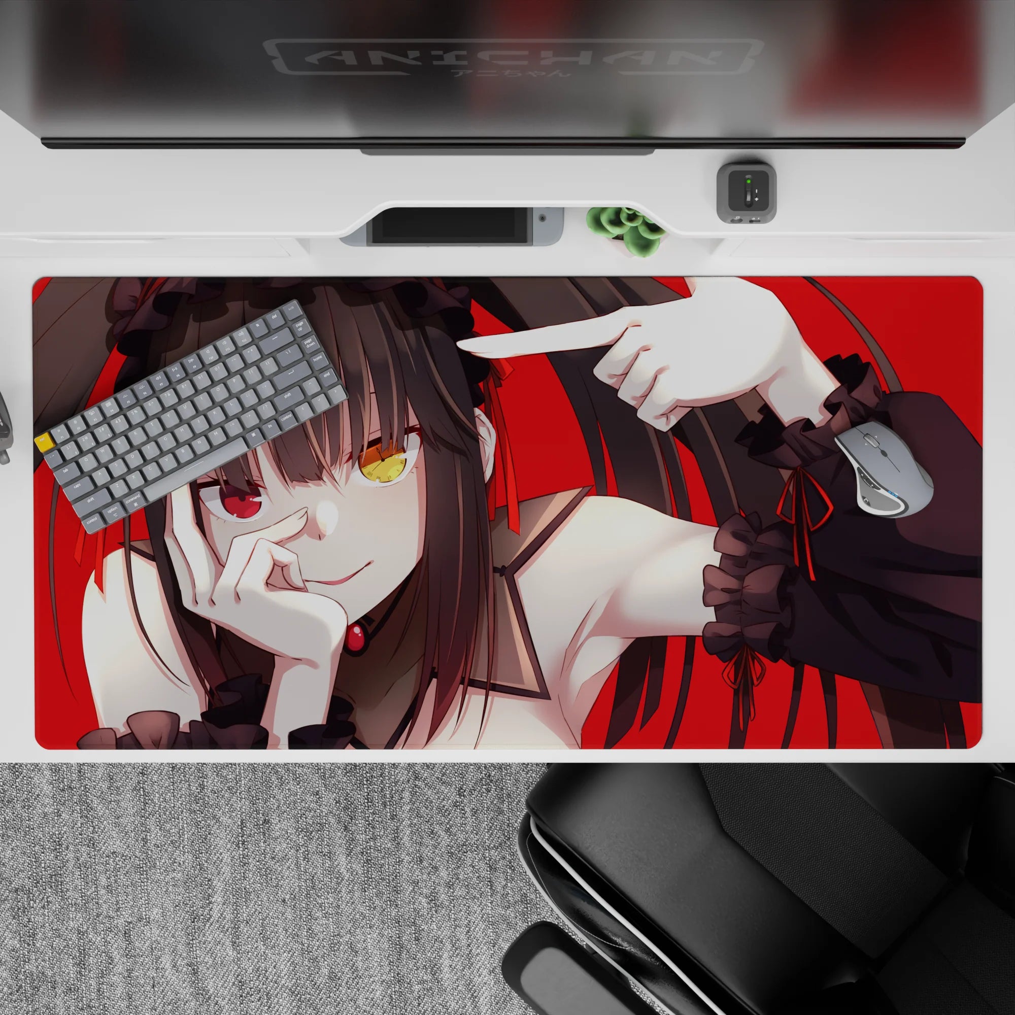 Goth-cute anime desk pad 40x20 inches in red and black, playful mischievous vibe with mismatched eyes.
