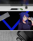 40x20 inches anime desk pad in deep black with electric blue V lines and teal eyes, cheeky focused vibe.