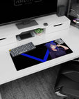 Cat-ear anime girl flashing a peace sign on mouse pad 28x12 inches, teal eyes on dark background.