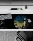 Moody blue-and-black anime desk pad 36x16 inches with faded clock, ink scratches, and calm grunge vibe.