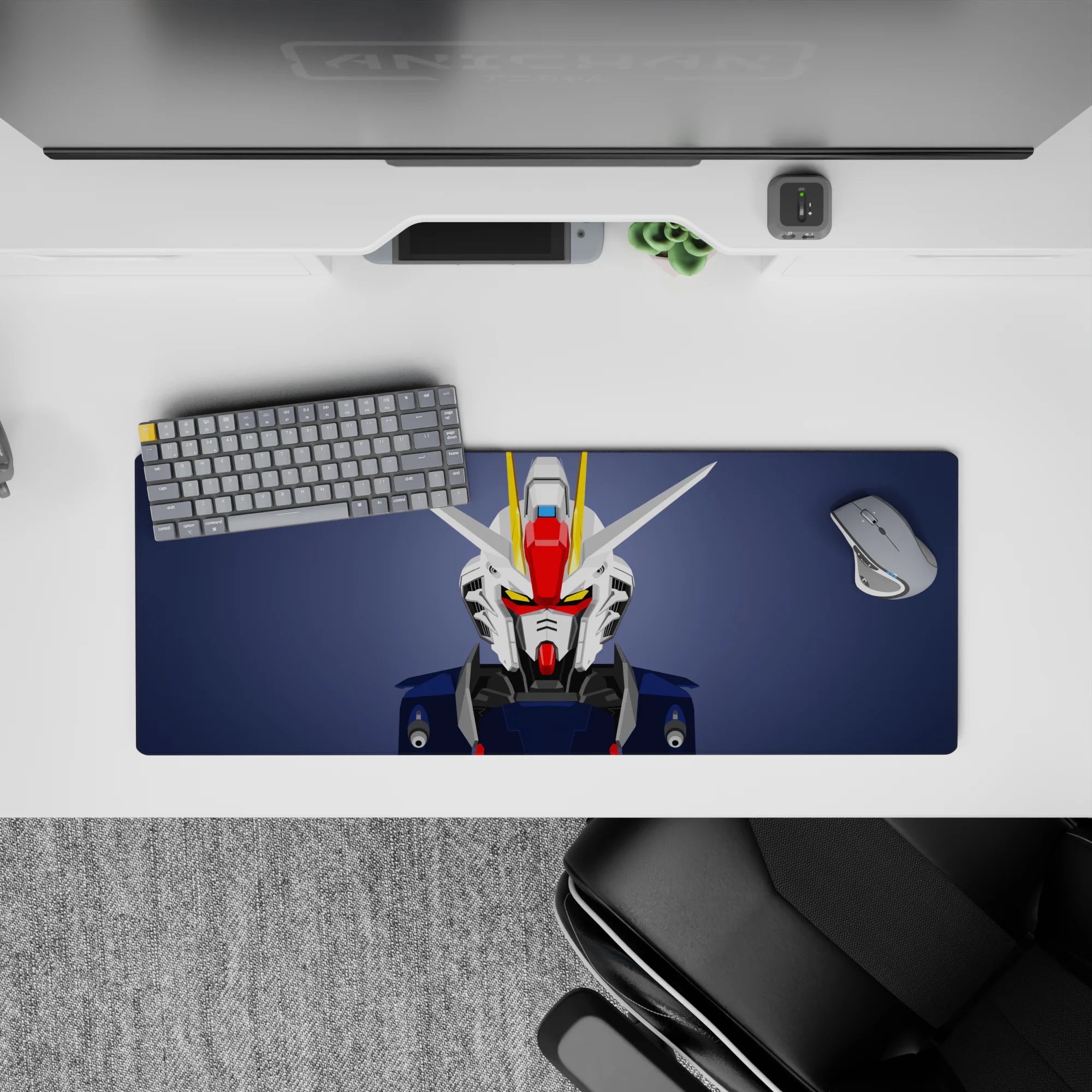 Slate background anime mouse pad 32x12 inches with white and navy armor, red faceplate, yellow V-fin.