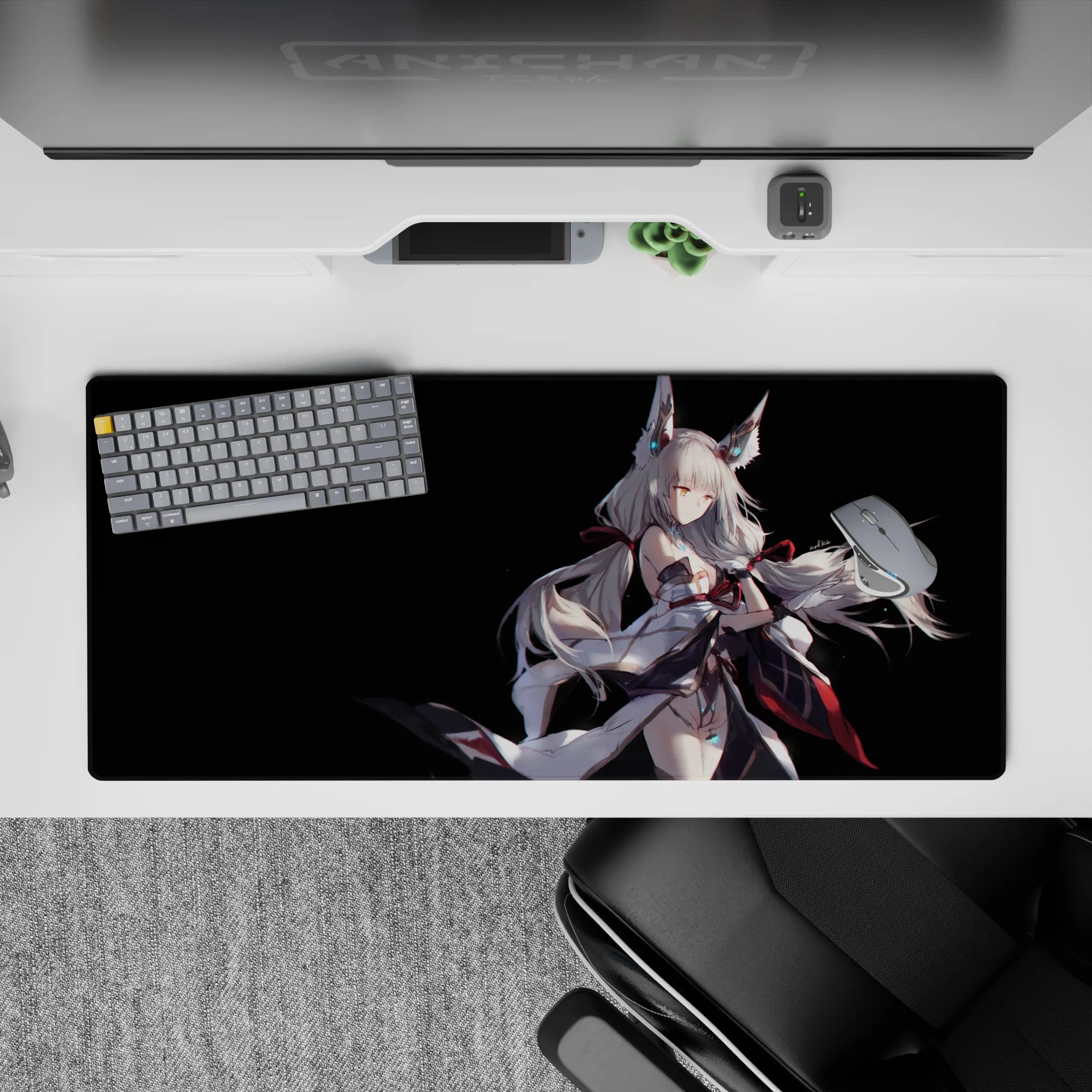Night-sky fantasy anime desk pad 36x16 inches in black with cyan glow accents and bold red ribbons.