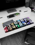 32x12 inches anime girl mouse pad featuring five sharp-posing girls with ribbons, frills, and glossy highlights.