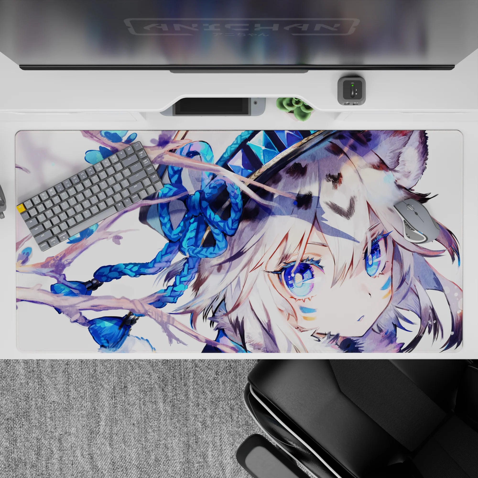 Cozy winter anime desk pad 40x20 inches in icy blues with sapphire eyes and dreamy floral accents.