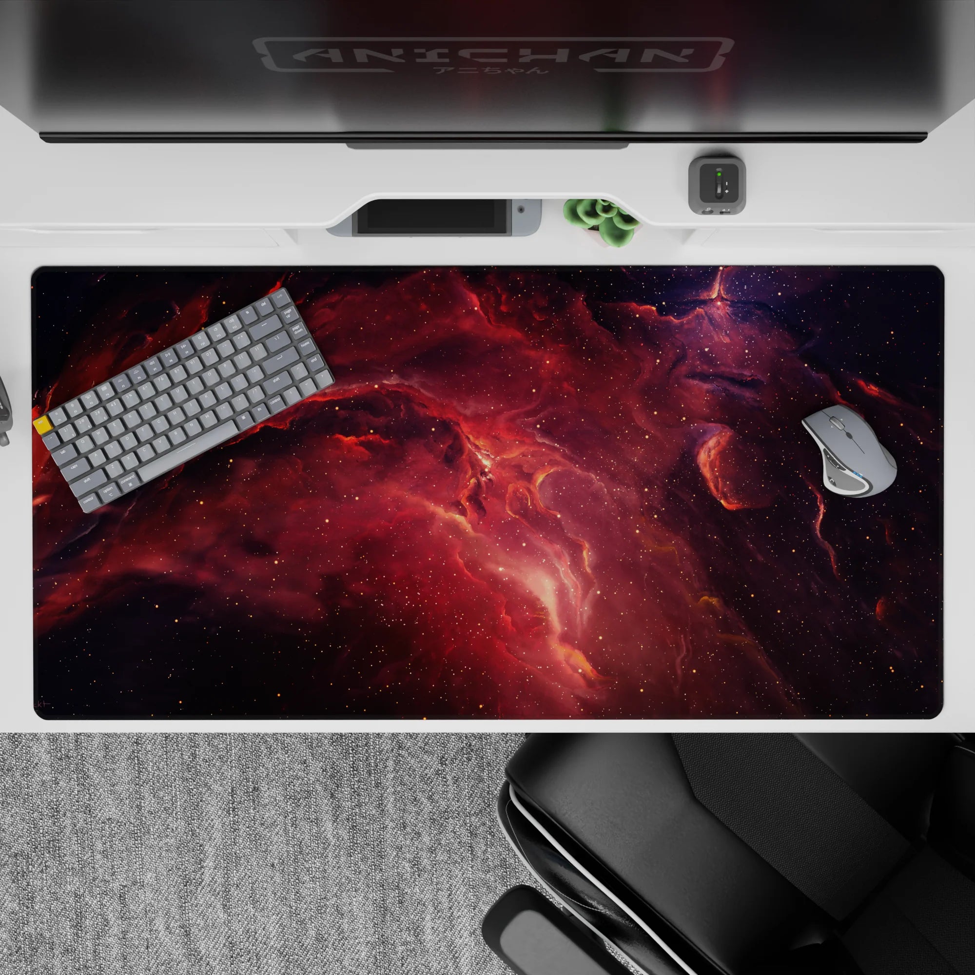 Galaxy-themed desk pad with swirling violet, purple, and ember-red tones, 40x20 inches, ideal for workspace décor.