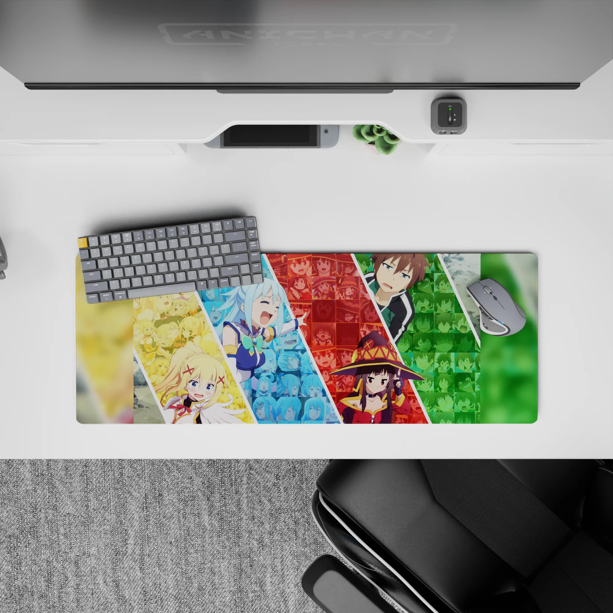 KonoSuba anime mouse pad 32x12 inches featuring Aqua, Darkness, Megumin, and Kazuma in a vibrant, chaotic collage.