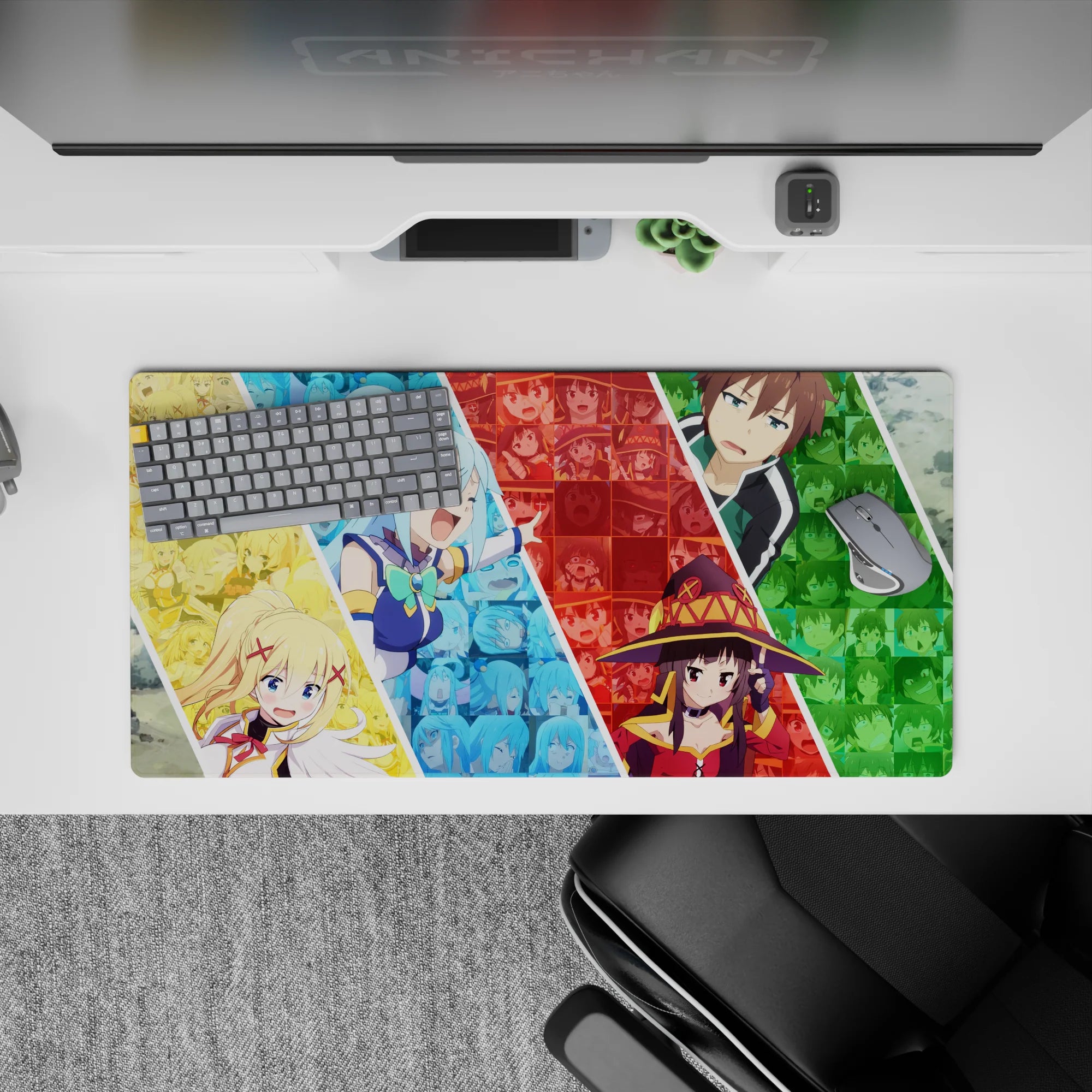 Anime mouse pad 32x16 inches featuring KonoSuba characters Aqua, Darkness, Megumin, Kazuma in vibrant, chaotic collage.
