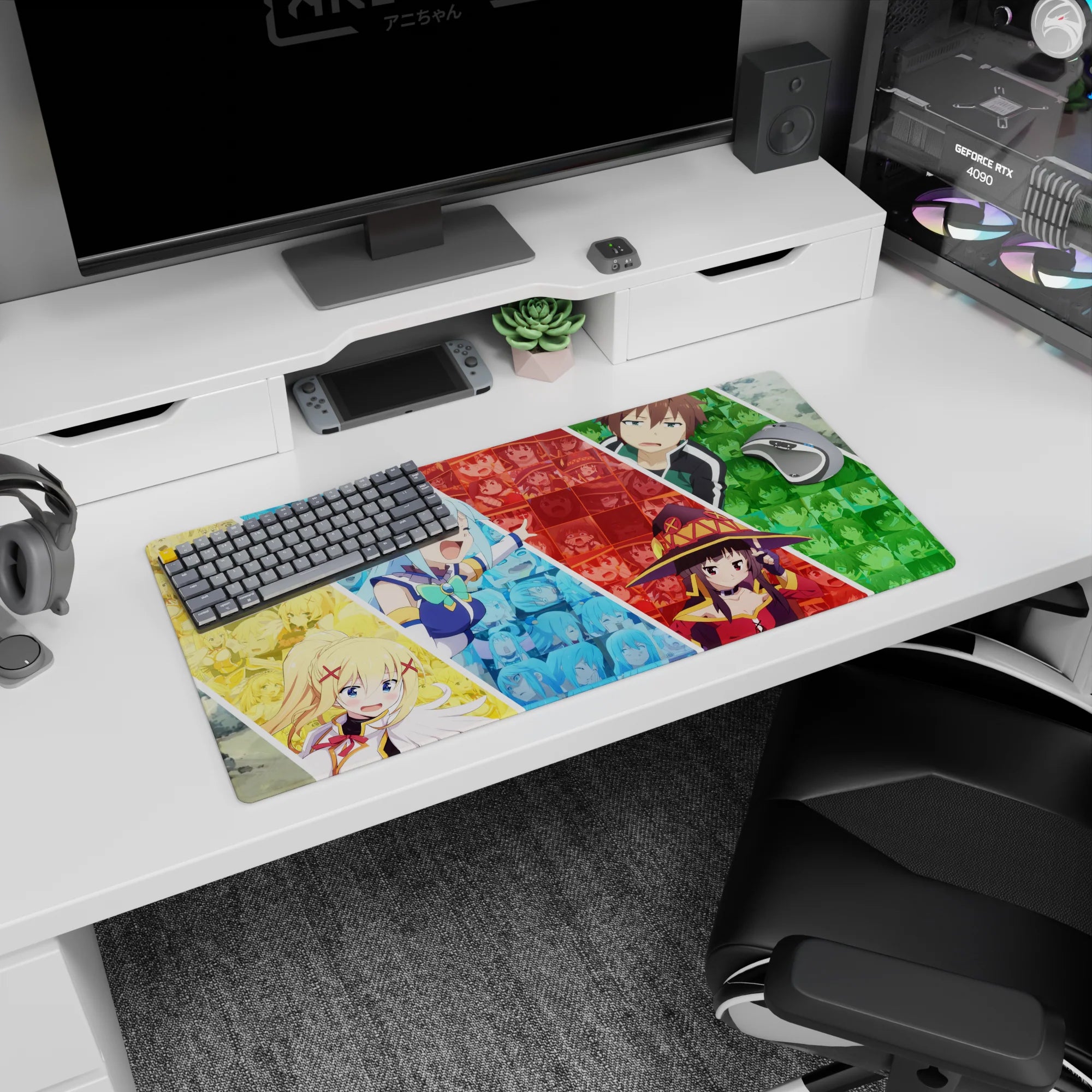 KonoSuba anime mouse pad 32x16 inches featuring Aqua, Darkness, Megumin, and Kazuma in a colorful, chaotic collage.