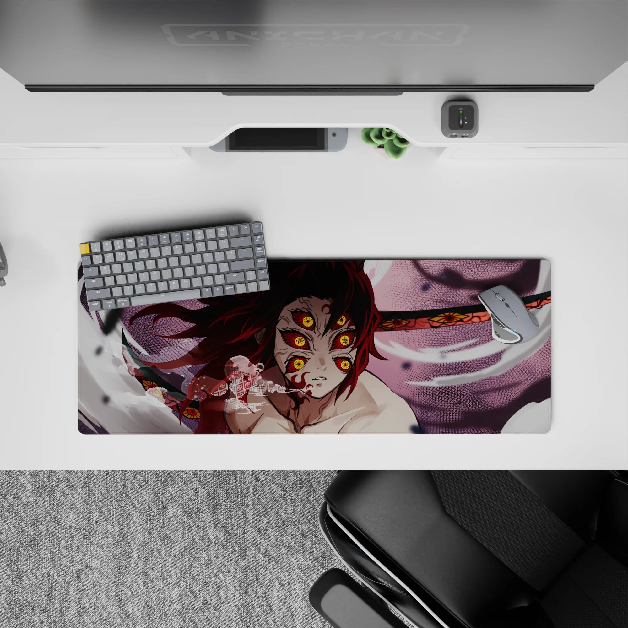 Anime mouse pad featuring Demon Slayer's Kokushibo with six burning eyes and blood-red blades on a 32x12 inch surface.