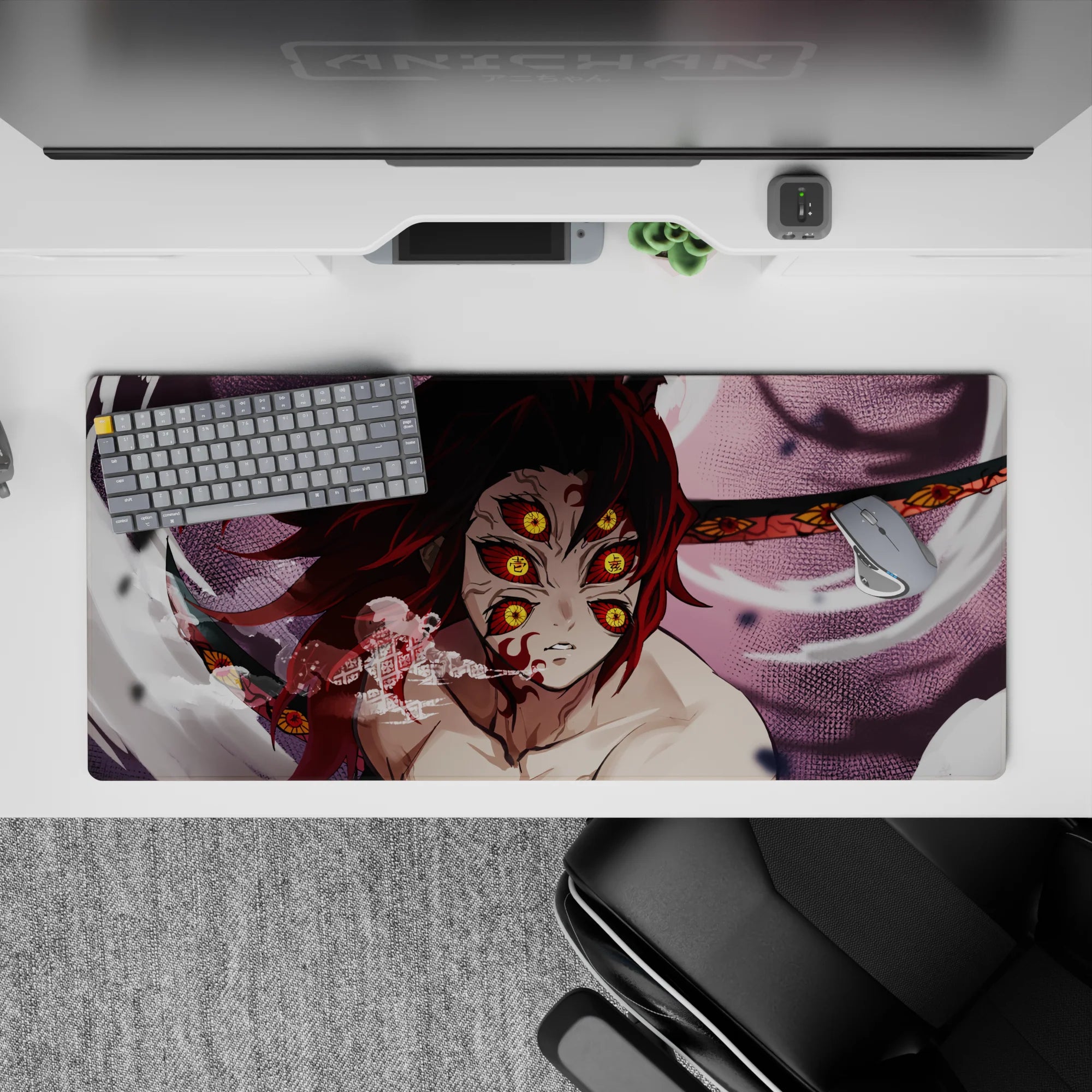 Demon Slayer desk pad 36x16 inches featuring Kokushibo with six eyes and red blades, capturing an eerie, intense vibe.