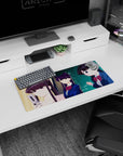 28x12 inches anime girl mouse pad featuring a purple-haired catlike student with wide-eyed friend and phone-checking cutie.