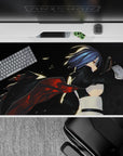 Midnight assassin aesthetic desk pad 40x20 inches in smoky black with hot red ember streaks.