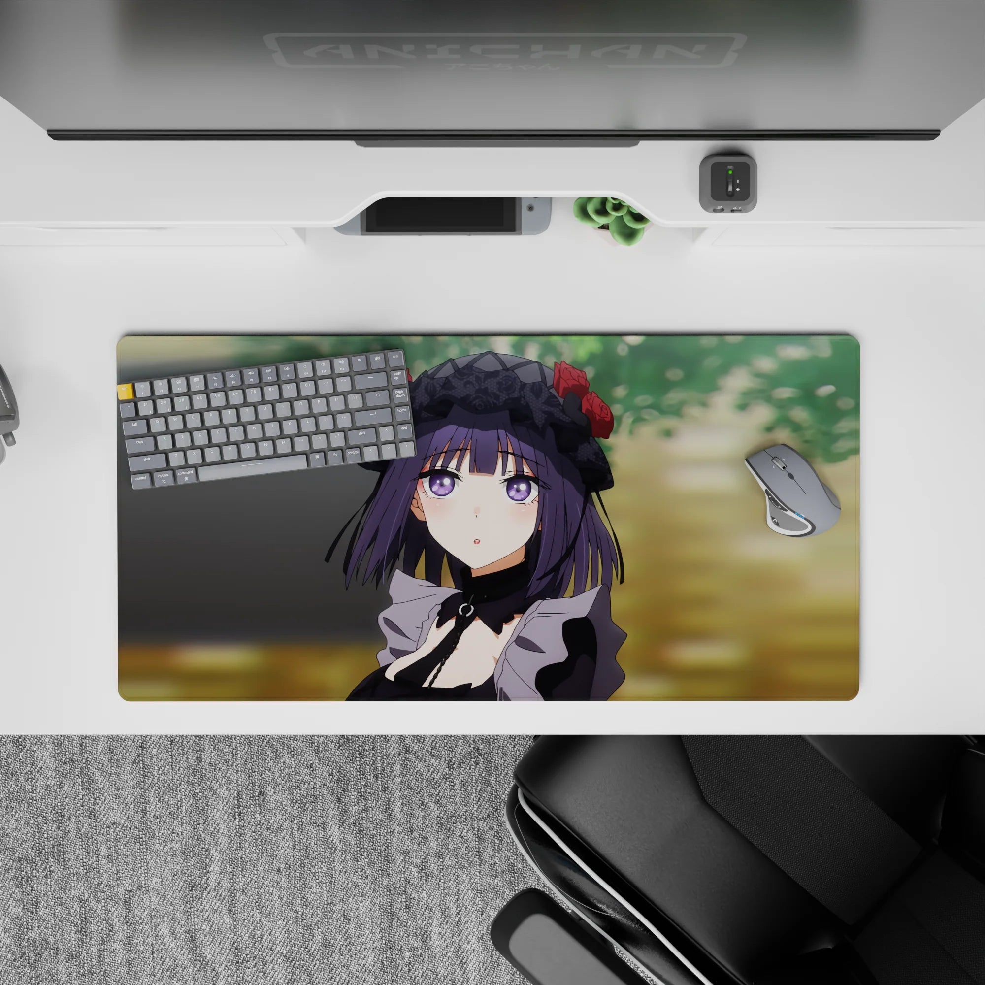 32x16 inches desk mouse pad in deep purple and black with dreamy violet eyes, warm calm green background.