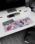 Anime mouse pad 32x12 inches featuring a grinning boy in a varsity jacket with friends, iced drinks, petals.