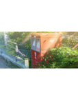 Anime desk pad 36x16 inches with red Japanese post box, vines, sunbeams, and soft lens haze.