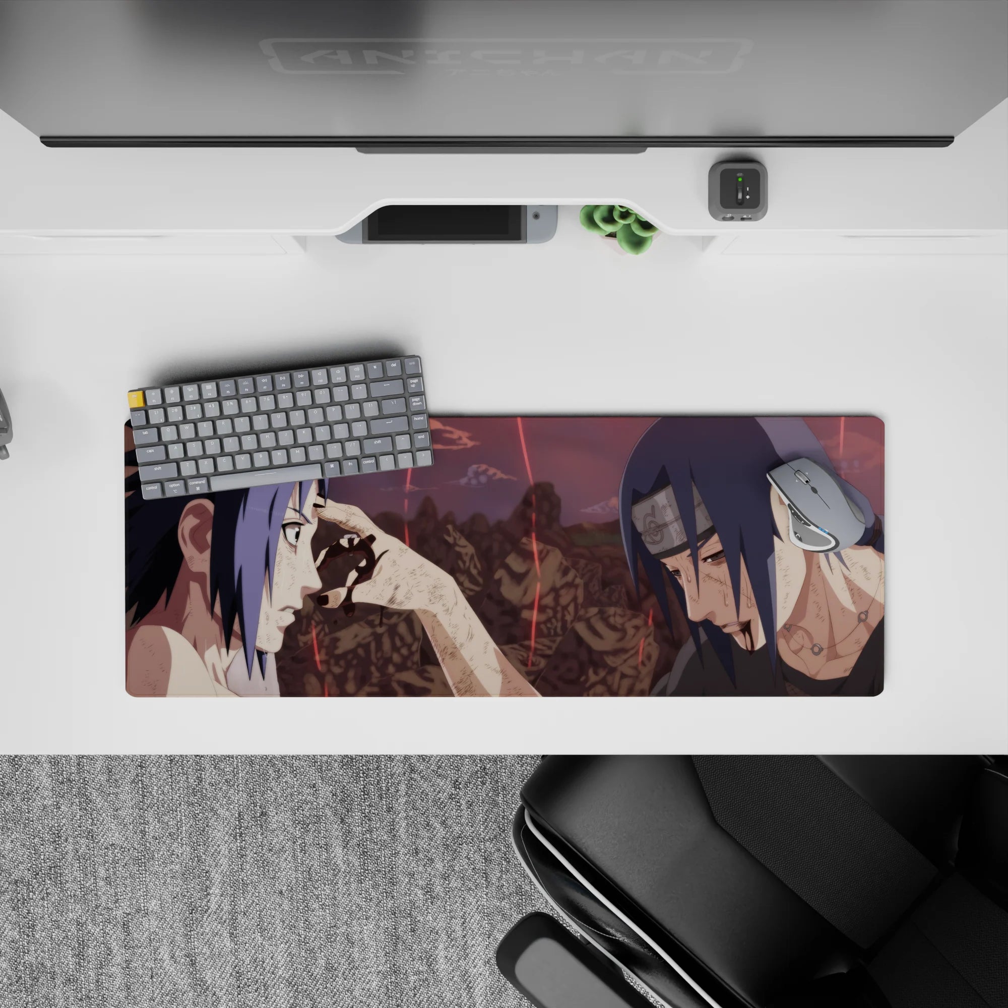 Anime mouse pad 32x12 inches featuring Itachi&#39;s iconic last moment with Sasuke from Naruto, capturing deep emotion.