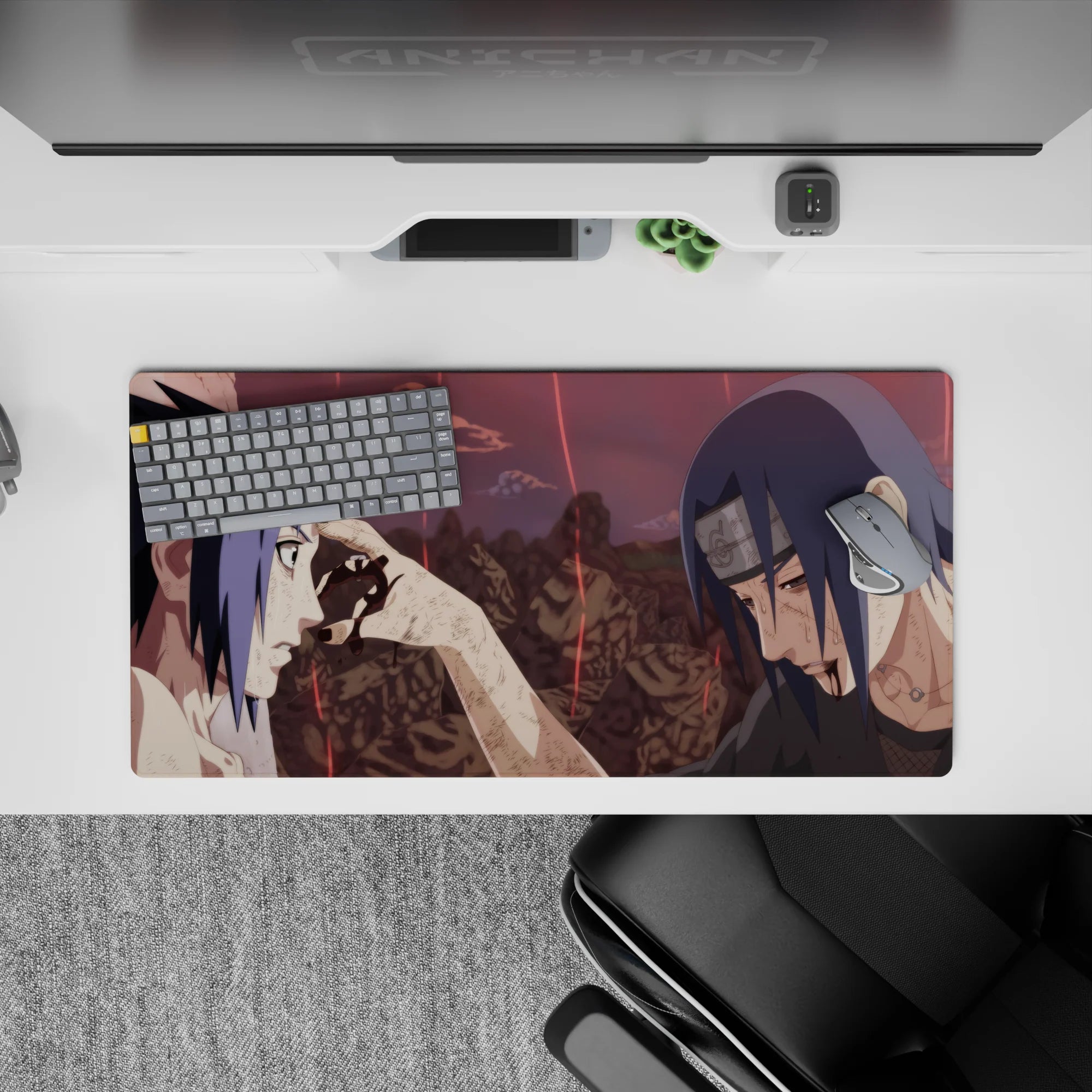 Anime mouse pad 32x16 inches featuring Itachi&#39;s final moment with Sasuke from Naruto, capturing emotion and cinematic depth.