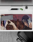 Anime mouse pad 32x16 inches featuring Itachi's final moment with Sasuke from Naruto, capturing emotion and cinematic depth.