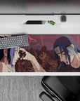 Itachi and Sasuke's final moment from Naruto on a 36x16 inch anime desk pad, capturing emotion and cinematic depth.