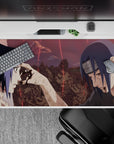 Anime desk pad 40x20 inches featuring Itachi and Sasuke's emotional scene from Naruto; vivid reds on a battle-worn backdrop.