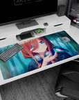 Anime girl greeting a tiny blue bird on a desk pad 40x20 inches, copper hair, gamer headphones.