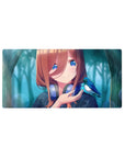 32x16 inches anime girl mouse pad with copper hair, silver headphones, plaid top, and blue bird.