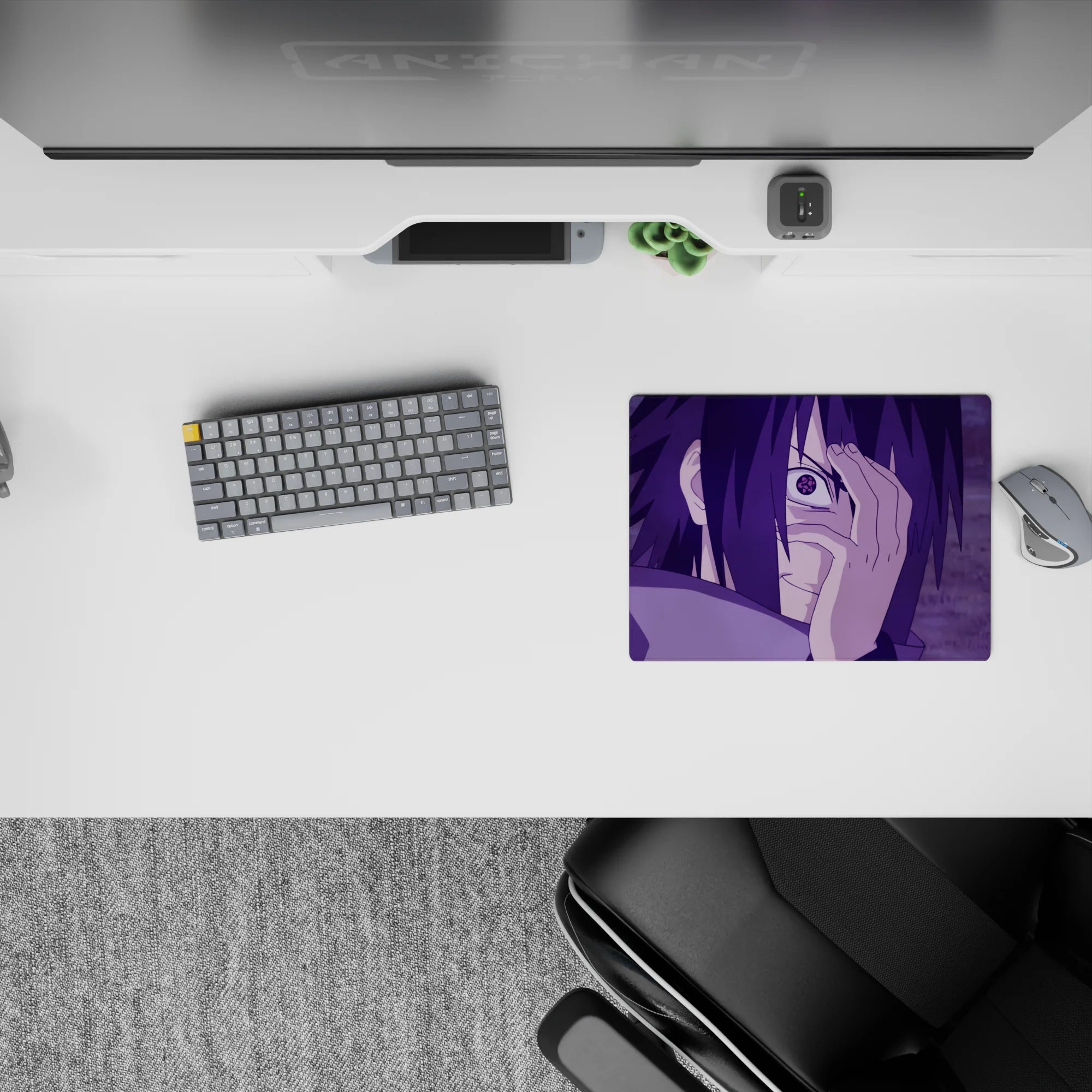 Sasuke Uchiha with Mangekyō Sharingan from Naruto on 14x10 inch anime mouse pad, featuring intense purple hues and iconic gaze.