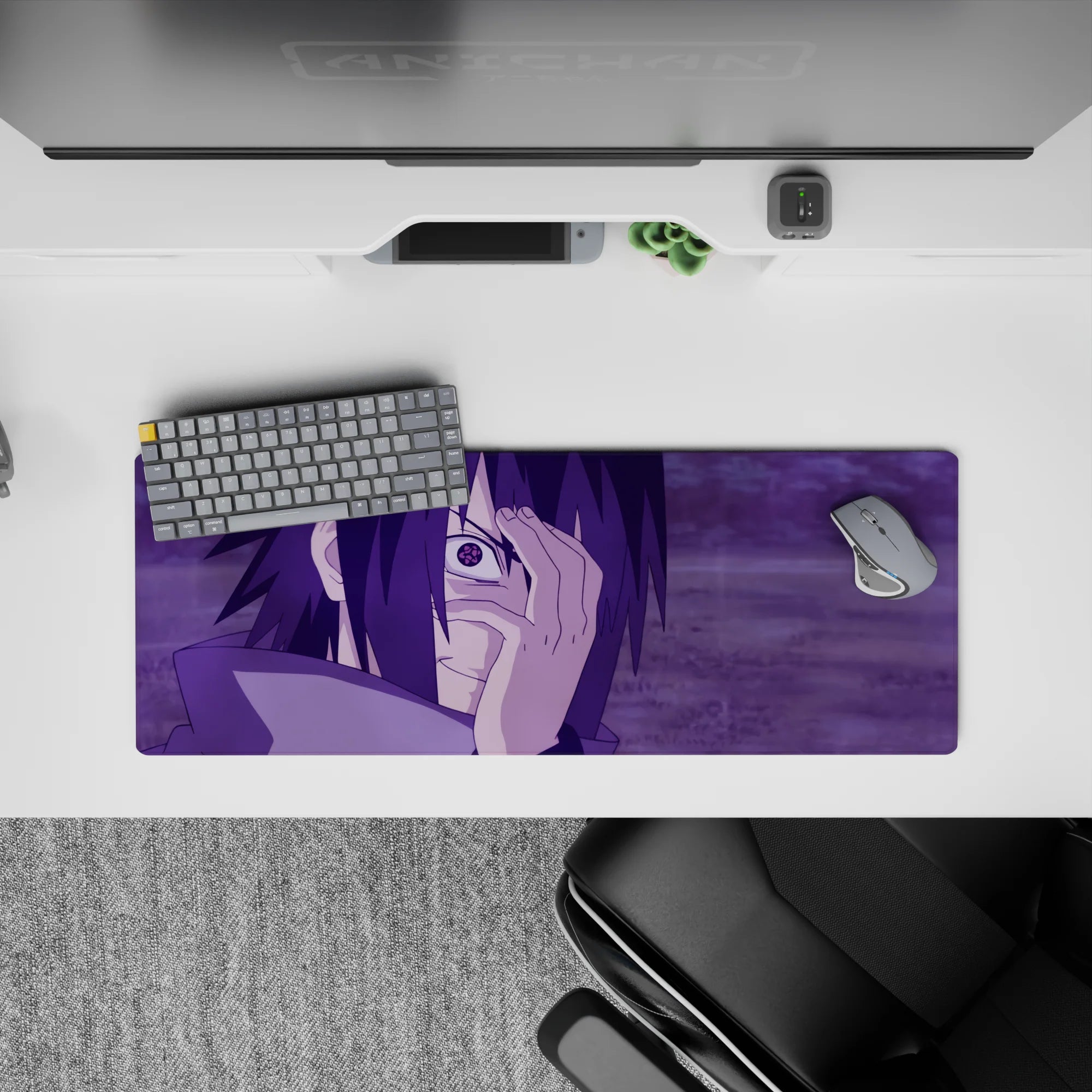 Mouse pad featuring Sasuke Uchiha with Mangekyō Sharingan from Naruto, size 32x12 inches, purple storm background.