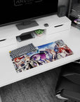 28x12 inches anime mouse pad featuring a violet-haired mage and green-eyed swordsmen at sea.