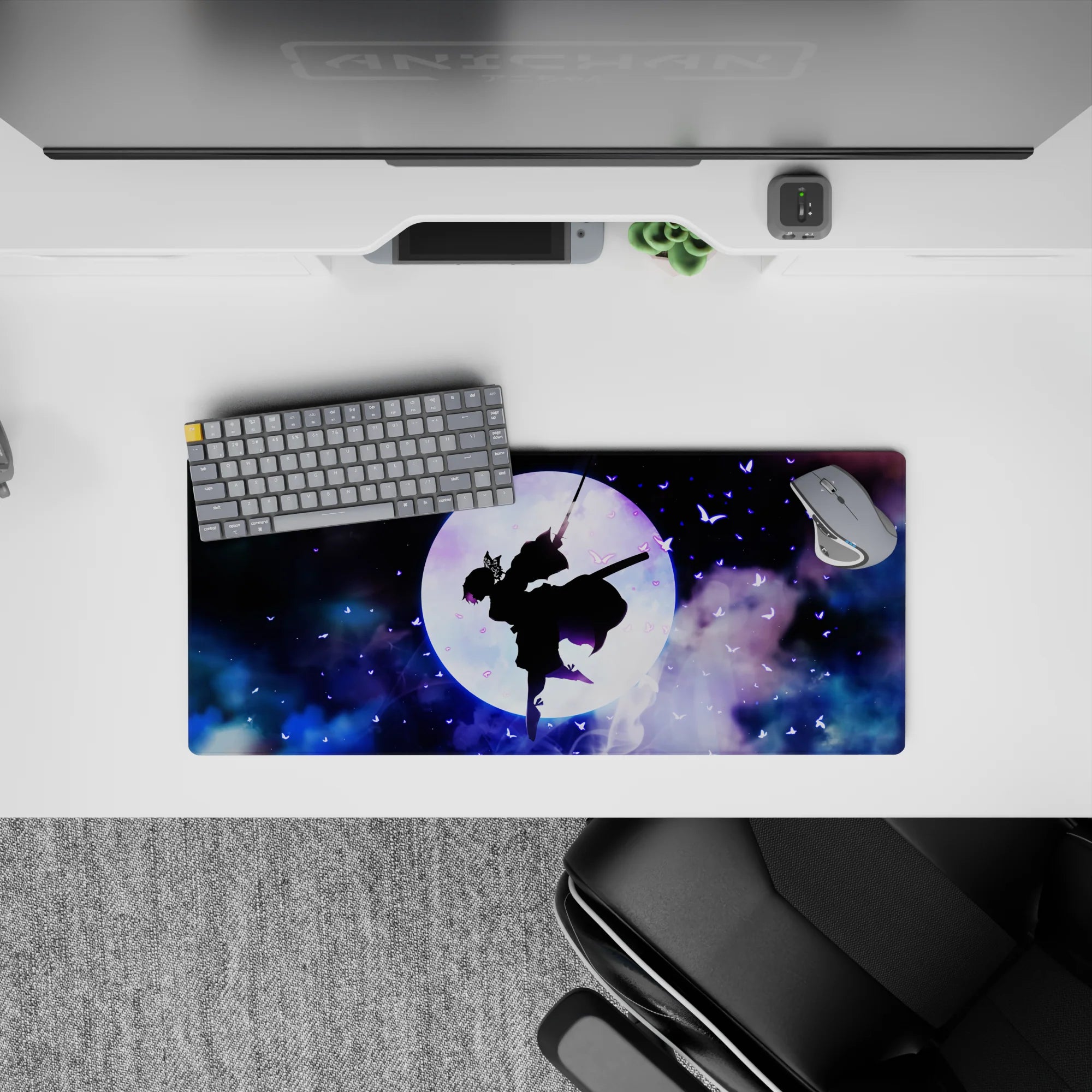 Shinobu silhouette on 28x12 inch mouse pad with glowing moon, violet butterflies, cosmic clouds from Demon Slayer anime.