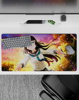 32x16 inches anime girl mouse pad in peach, violet, and gold sunset tones with sparkly light flecks.