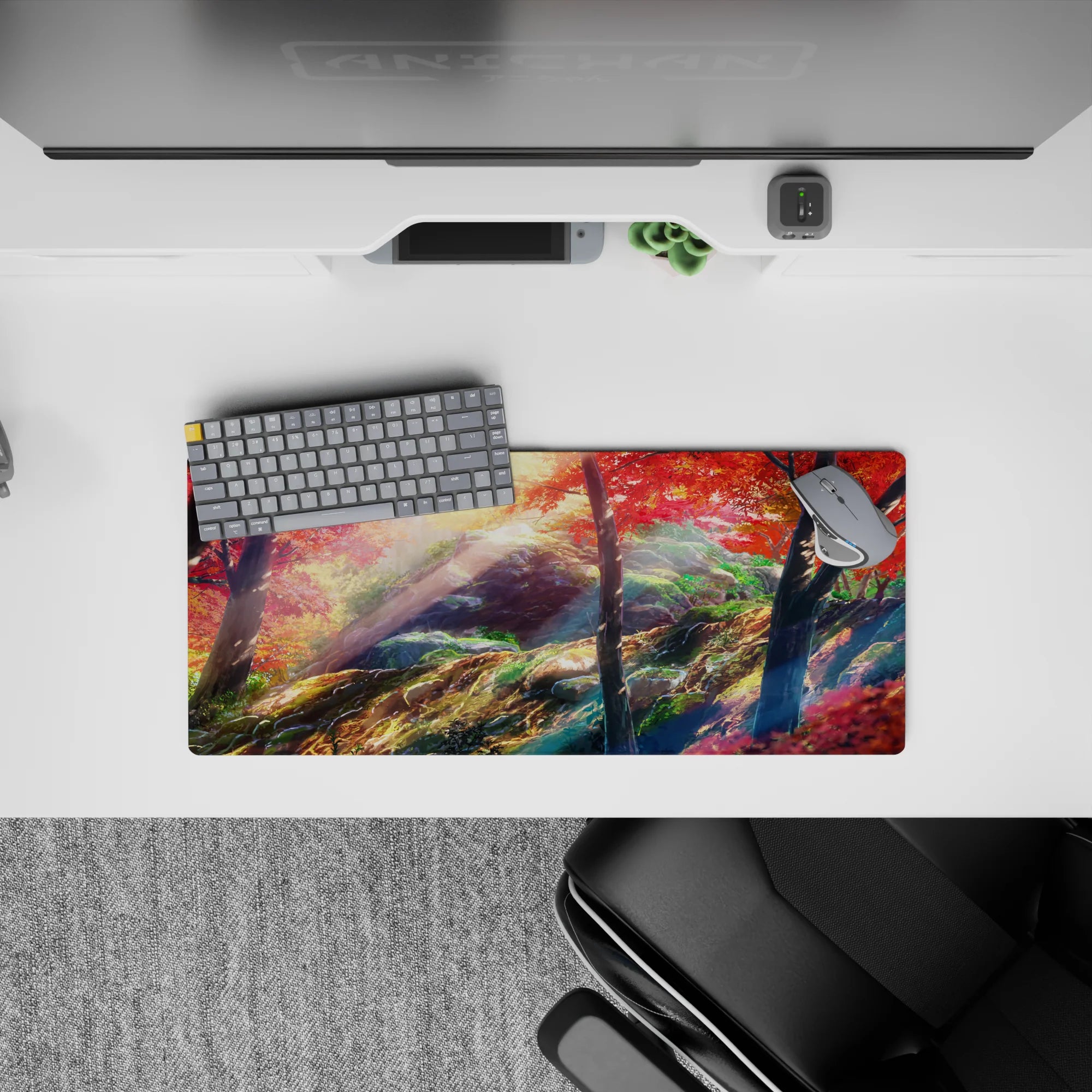 28x12 inches anime mouse pad in warm fall tones—crimson reds, golden light, deep greens, calm mountain vibe.
