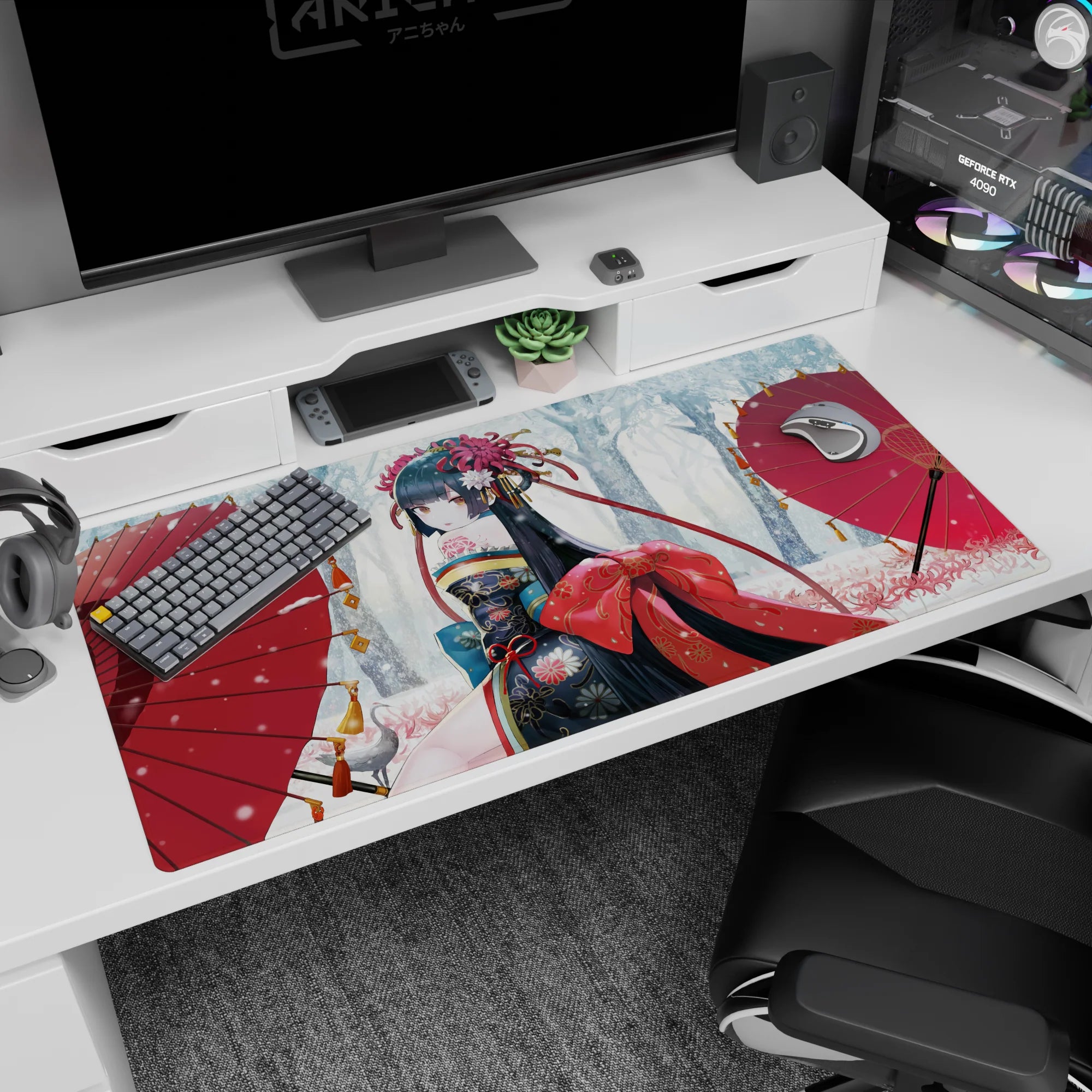 40x20 inches desk pad showing a shy anime girl glancing back in snowfall, framed by two red parasols.