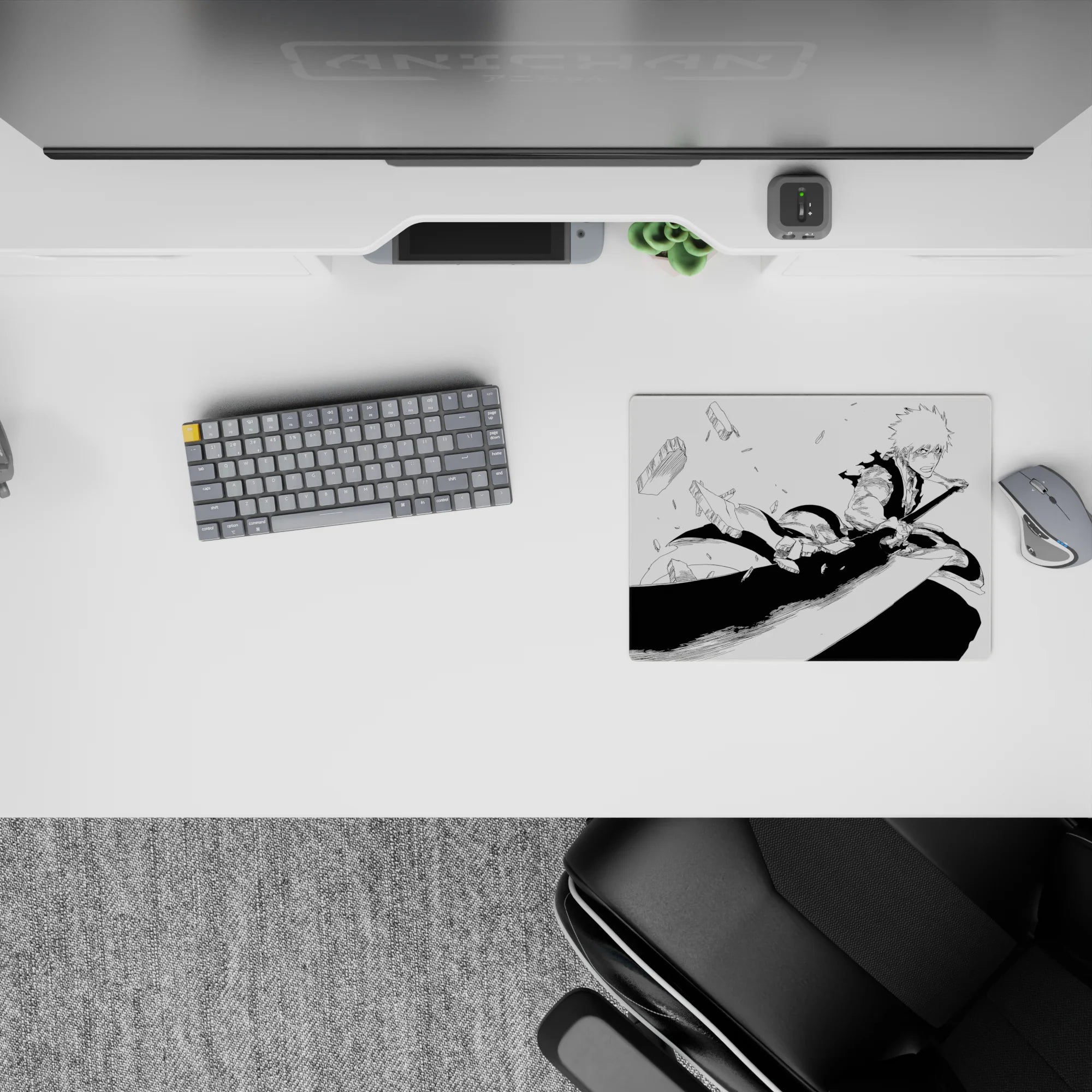 Ichigo Kurosaki from Bleach on 14x10 inches mouse pad, mid-strike in monochrome, dynamic manga-style energy.