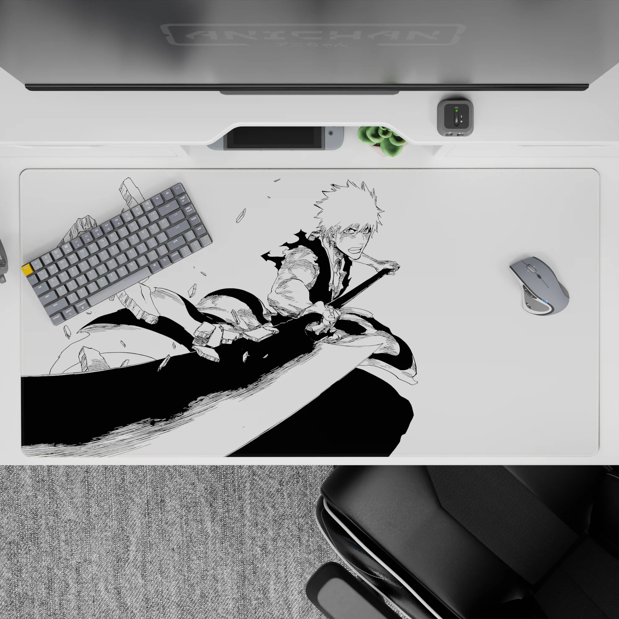 Ichigo's rage from Bleach captured in a 40x20 inches anime desk pad, showcasing dynamic black-and-white manga art.