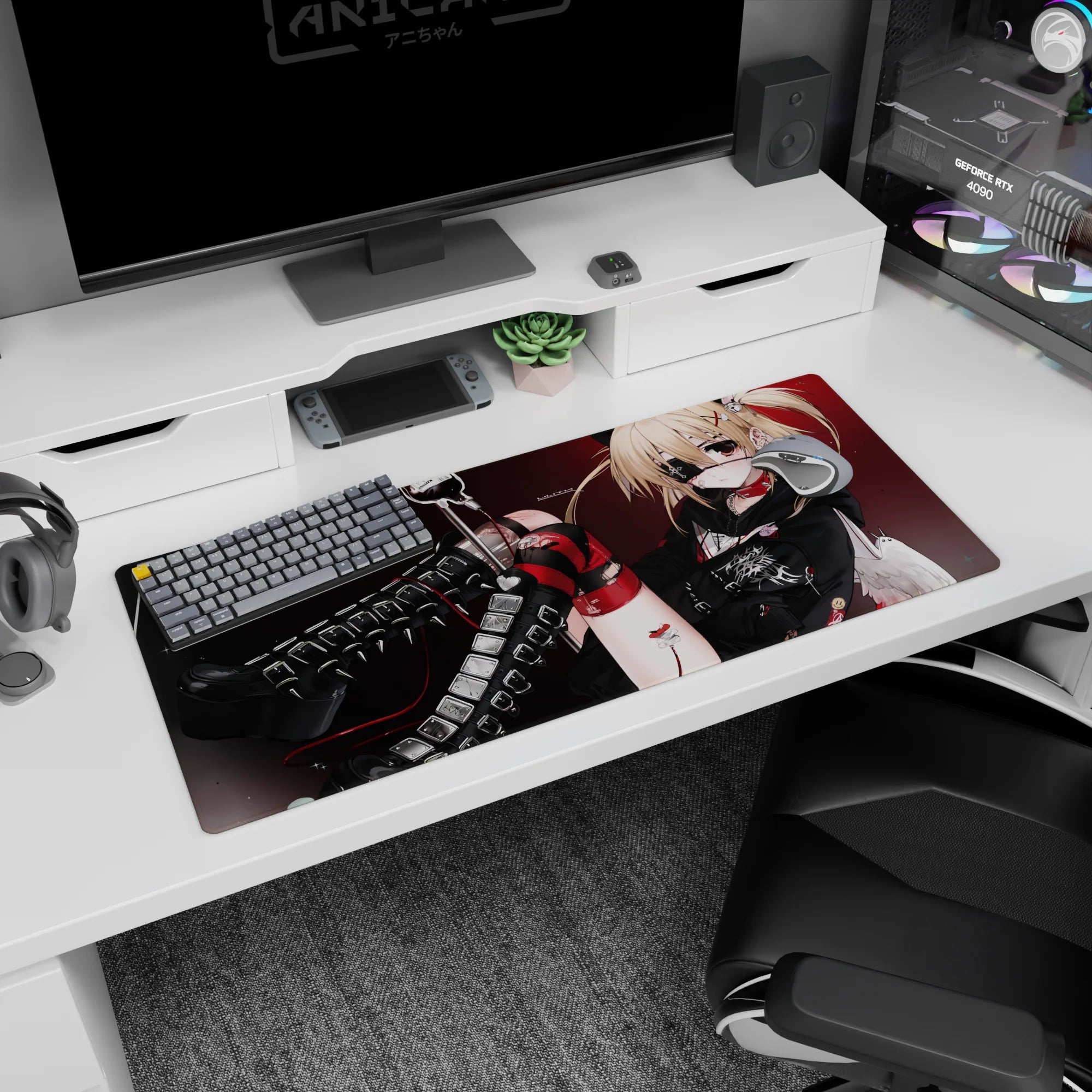 Blonde eyepatch heroine on anime desk pad 36x16 inches, punk angel pose with buckles, red cable line.