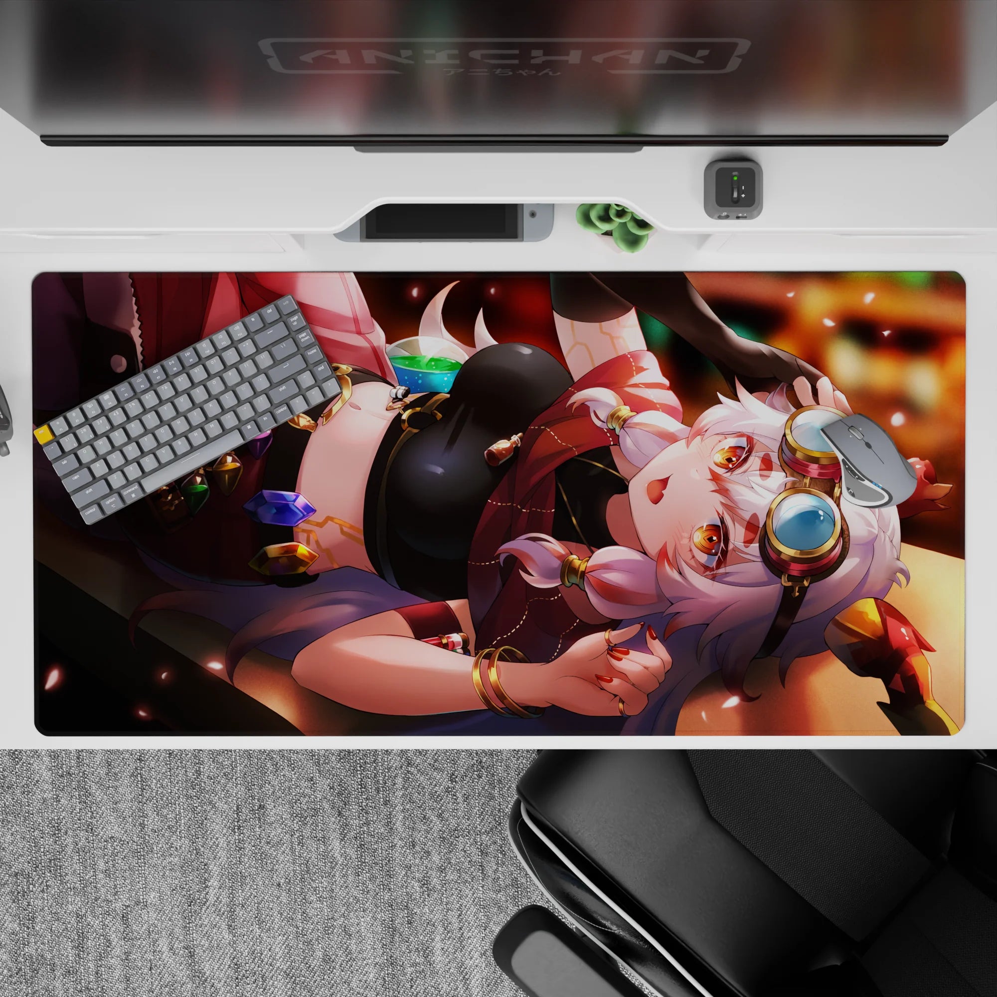 Cozy mischief 40x20 inches anime desk pad in ruby red and caramel glow with jewel-toned charms.