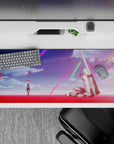 36x16 inches anime desk pad in vivid crimson and violet, neon streaks and drifting leaves, calm after battle.