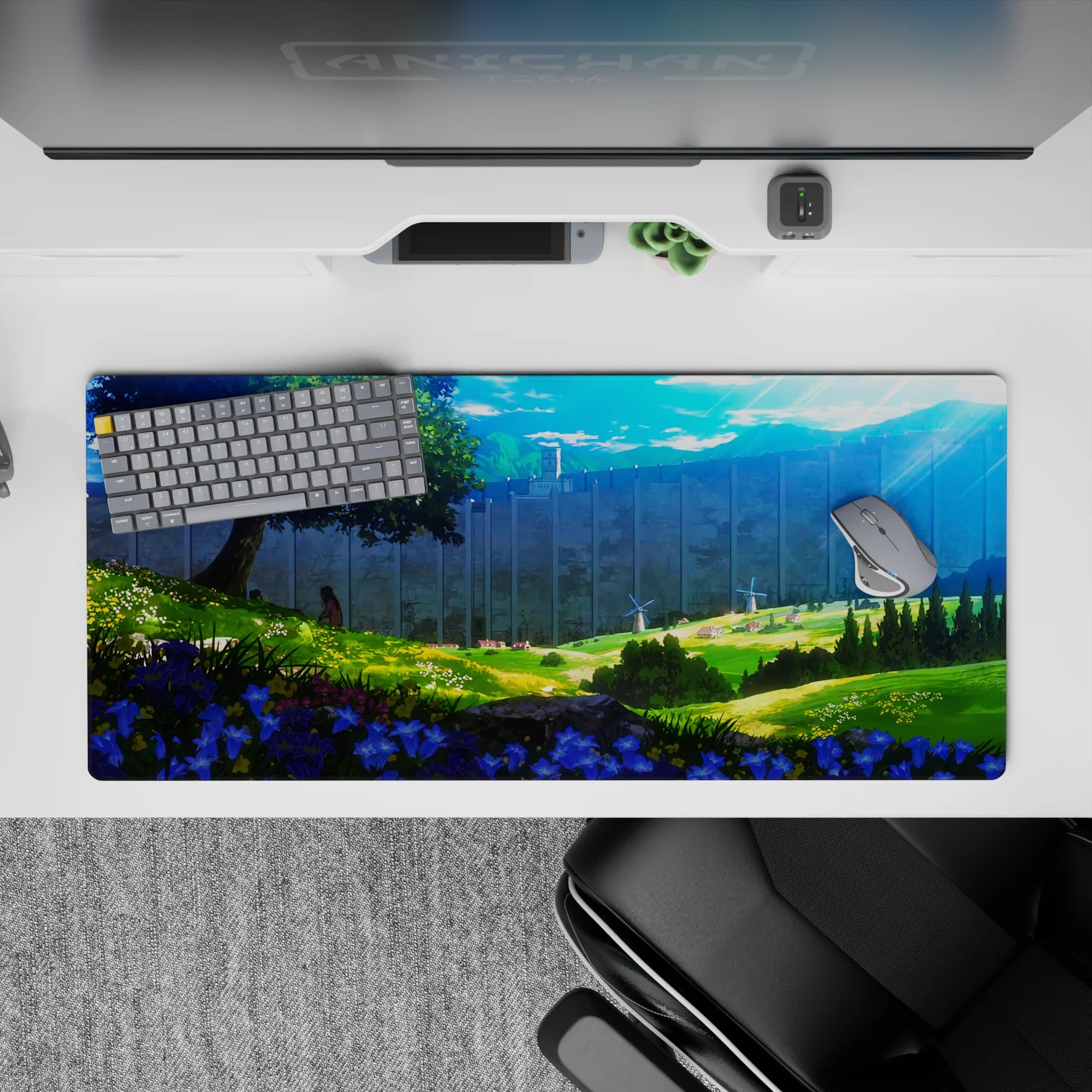 Attack on Titan desk pad 36x16 inches featuring a peaceful scene with sunlight, wildflowers, and the iconic wall.
