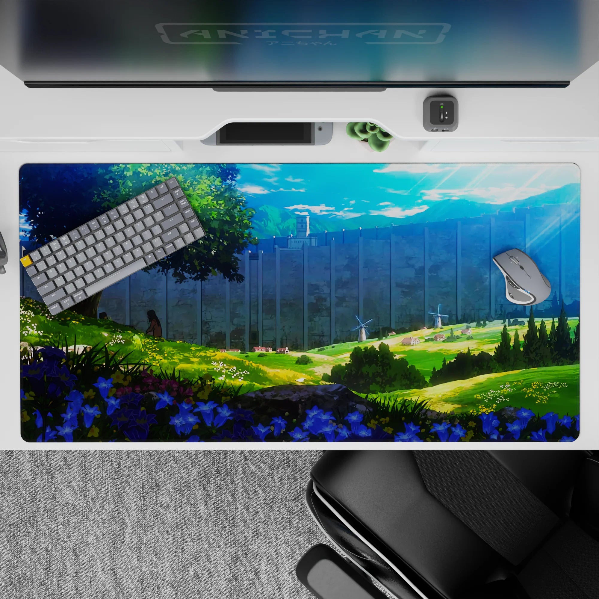 Anime desk pad 40x20 inches featuring a serene Attack on Titan scene with sunlight, wildflowers, and distant wall.
