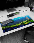 Attack on Titan anime desk pad 36x16 inches, featuring a peaceful landscape with wildflowers, hills, and a distant wall.
