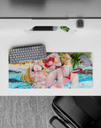 Anime girl mouse pad 28x12 inches in ocean blues with glossy reds, warm gold hair, and jewel accents.