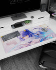Blue-haired anime girl holding a card, lounging on a pillow with floating stars, desk pad 36x16 inches.